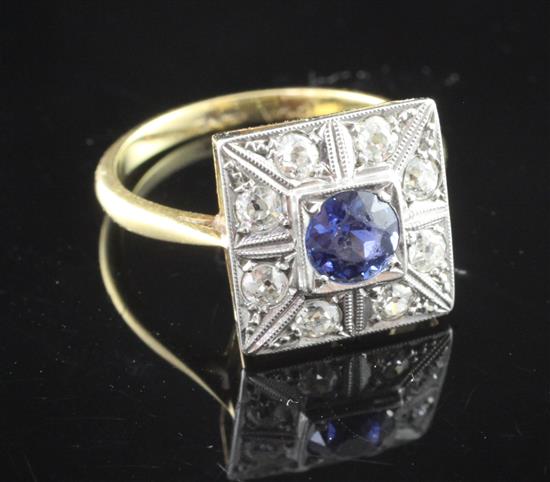 An 18ct gold and platinum, sapphire and diamond square cluster ring, size N.